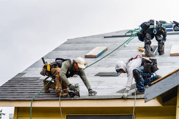 Professional Gutter Installation technician working in Blue Mountain, MS
